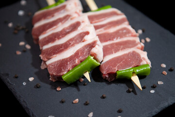 fresh raw meat presentation on granite
