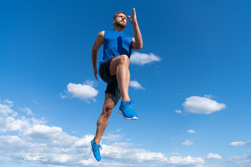 healthy man running. guy in sportswear. full of energy. feel freedom. marathon speed.