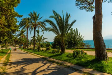 Fototapeta na wymiar ANTALYA, TURKEY: Beautiful Karaalioglu park with palm trees on a sunny day in Antalya.