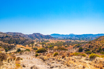 Fototapeta na wymiar Faliraki walking path and mountain landscape panorama Rhodes Greece.