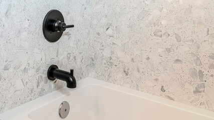 Pano Rectangular white bathtub on a home bathroom interior with minimalist design