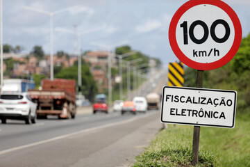 salvador, bahia, brazil - april 24, 2019: traffic sign indicates maximum speed of 100 km per hour...