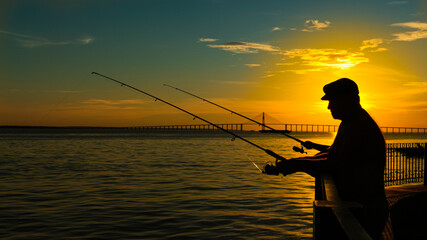 fishing at sunset