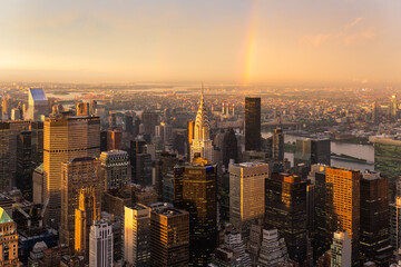 Fototapeta na wymiar New York City skyline with Manhattan skyscrapers at dramatic stormy sunset, USA.