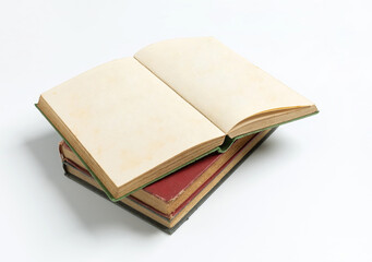 stack of open old book on white background for mockup blank template