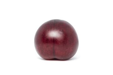 Fresh red shiny plum isolated on white background