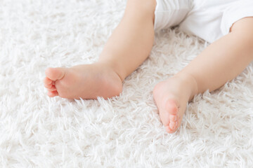 Obraz na płótnie Canvas 赤ちゃんの足