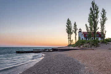 lake michigan lighthouse at sunrise