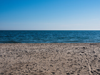 Topographic geometry of sky, sea, and beach. Three elements of the earth aligned parallel with the sea between the sky and land.