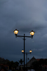 Fototapeta na wymiar black light pole in urban area