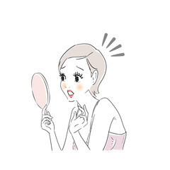 鏡でお肌をチェックする女性