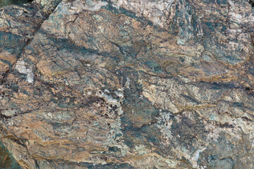 Grunde Abstract stone background. The texture of the stone. Close-up.