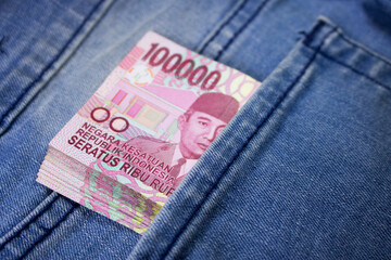 rupiah money inside of jeans pocket indonesia currency - 448170860