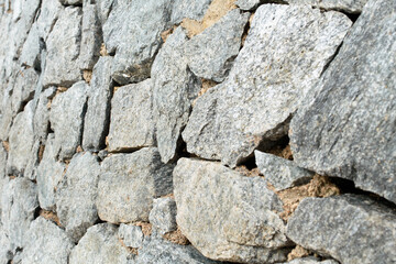 Nature stone on the ground at coast.