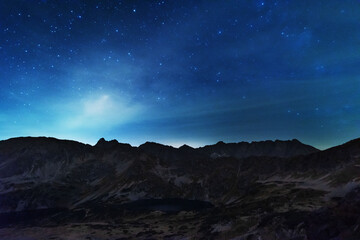  Bright starry sky with the milky way on the background of High Tatras mountains