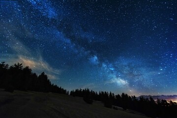 Obraz na płótnie Canvas Night photos in the High Tatras Mountains with a bright starry sky and the Milky Way 