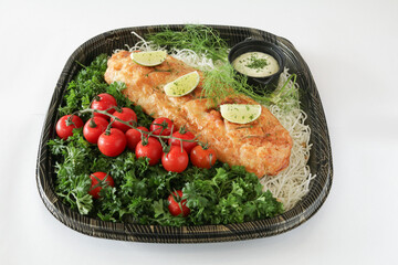 bbq baked salmon fish seafood pie pastry roll with vegetable salad and chef sauce in bento box white background Christmas festival menu