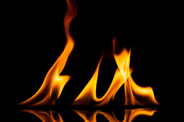 Fototapeta na wymiar Flame fire movement on a black background.