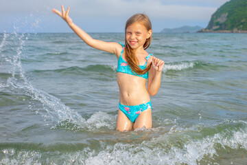 teen girl in the sea 