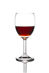 Red wine in glass on a white background.