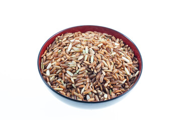Thai brown rice berries on white background.