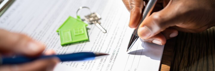 Signing Property Contract Paper