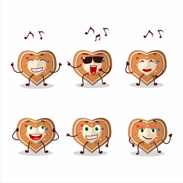 An image of gingerbread heart dancer cartoon character enjoying the music