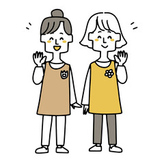 手を振っている保育士