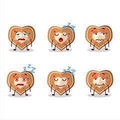 Cartoon character of gingerbread heart with sleepy expression