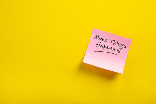 sticky note with make things happen word.