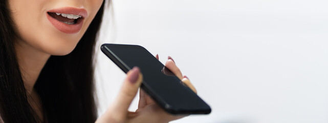 Woman Talking Using Voice Control