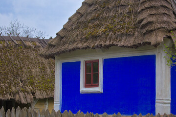 Kyiv. Pirogovo. Ukraine - Traditional ukrainian old house with straw roof. National architecture....