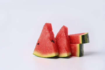 Pieces of fresh watermelon on white background.