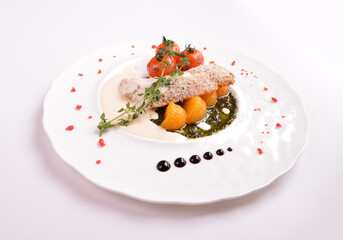 deep fried bake bread fish fillet seafood with orange and tomato in chef rosemary sauce and vegetables in white background for Christmas festival menu