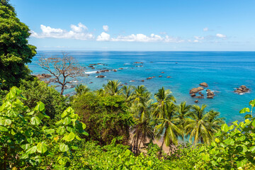 Cano island (Caño island) biological reserve landscape over tropical palm trees and Pacific Ocean,...