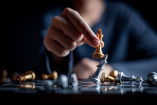 young child playing chess board game for strategy and intelligance game concept. 