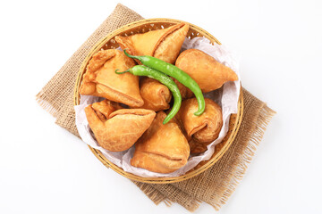 Indian food Samosa,A samosa is a deep fried or baked pastry with a savoury filling, such as spiced potatoes, onions, peas