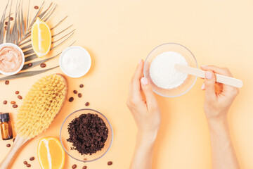 Home skin care, female hands mix natural clay to prepare cosmetic mask