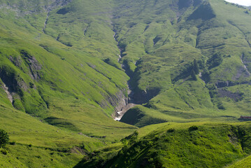 Scenic landscape with furrows of mountain Brienzer Rothorn at Bernese Highland on a sunny summer...