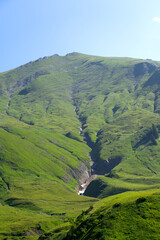 Scenic landscape with furrows of mountain Brienzer Rothorn at Bernese Highland on a sunny summer...
