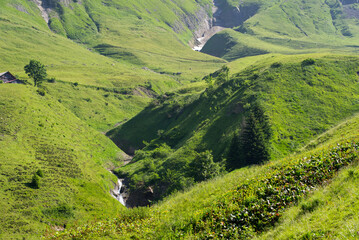 Scenic landscape with furrows of mountain Brienzer Rothorn at Bernese Highland on a sunny summer...