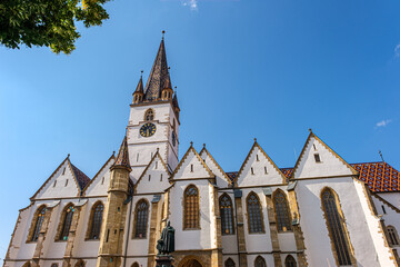 Saint Mary Lutheran Cathedral in Sibiu city on blue sky, Romania © Roberto Sorin