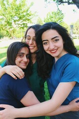 Team  portrait of healthcare worker friends / intern doctors / medical student women together & smiling happy *2