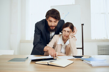 business man harassing secretary at work harassment office