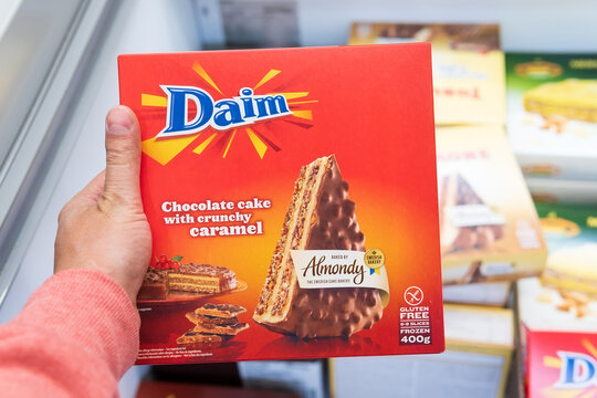 Tyumen, Russia-june 08, 2021: Chocolate cake with crunchy caramel. Brand Daim. Buying sweets in a hypermarket