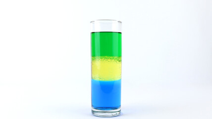 Liquid or layer density experiment using 3 separate layers consisting of water, olive oil and...
