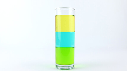 Liquid or layer density experiment using 3 separate layers consisting of syrup, water and olive oil on the top layer. The science concept of density - obrazy, fototapety, plakaty