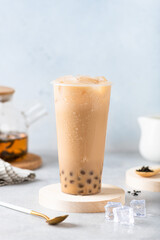 Taiwan milk bubble tea with tapioca in a plastic cup, selective focus