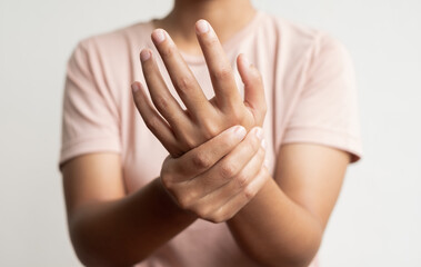 Woman hand with numbness and pain in the palm of the hand has pain and tingling in the nerve...