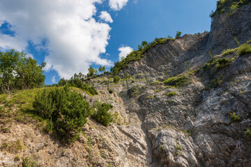Fototapeta na wymiar Rockfall barrier with wire mesh in mountain (brake for rocks fall), Italian Alps, Trentino Alto Adige, Italy, Europe.